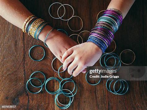 girl wearing bangles stock  high res pictures  images