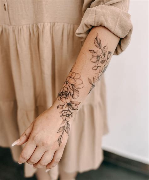Floral wrist tattoo flower wrist tattoo wrist tattoo designs feminine ...