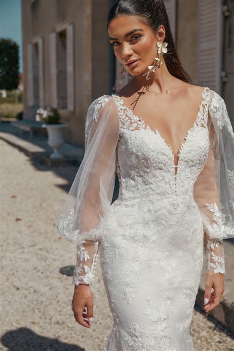 44465: Lace Fit and Flare Bridal Gown with Sheer V-Back and Whisker