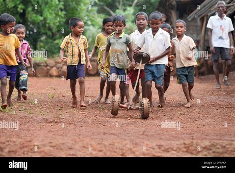 Katkari tribal children playing on the street, Karambali village ...