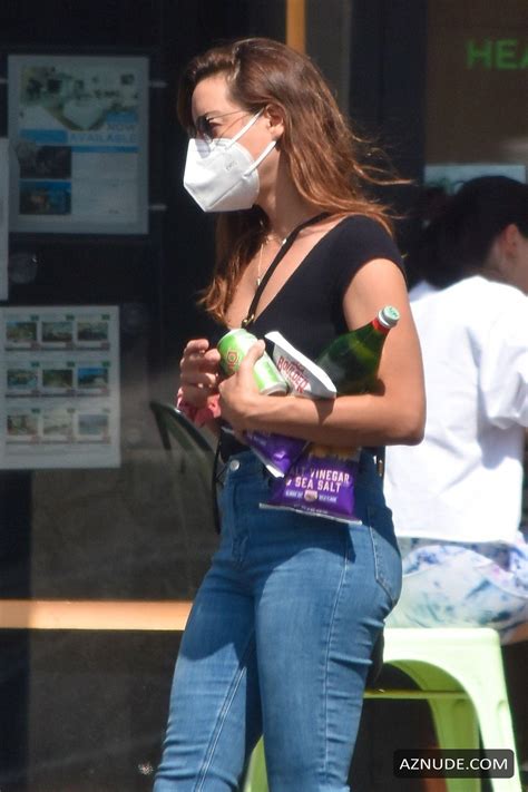 Aubrey Plaza Braless pumping gas in Los Feliz - AZNude
