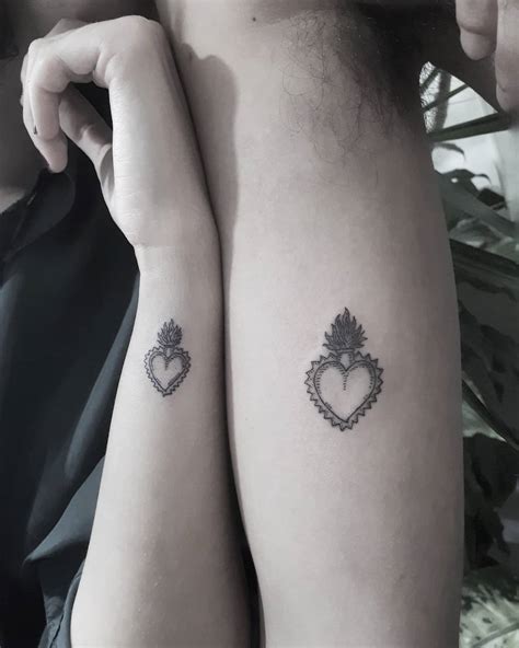 Matching hearts for a couple - Tattoogrid.net