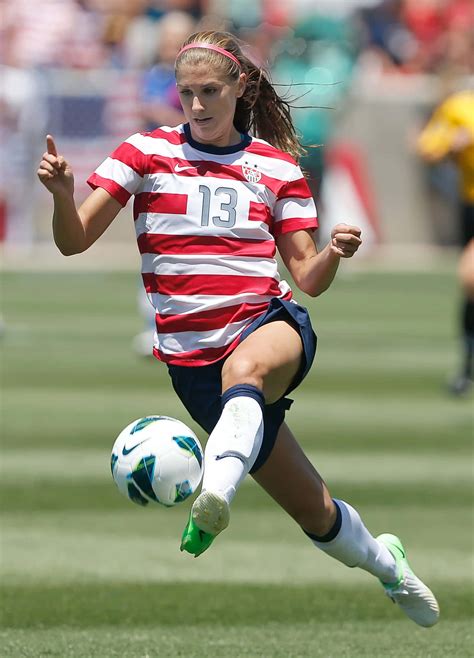 Download Alex Morgan Shines on the Pitch | Wallpapers.com