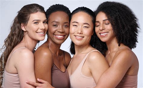 Face portrait, beauty and group of women in studio on gray background ...