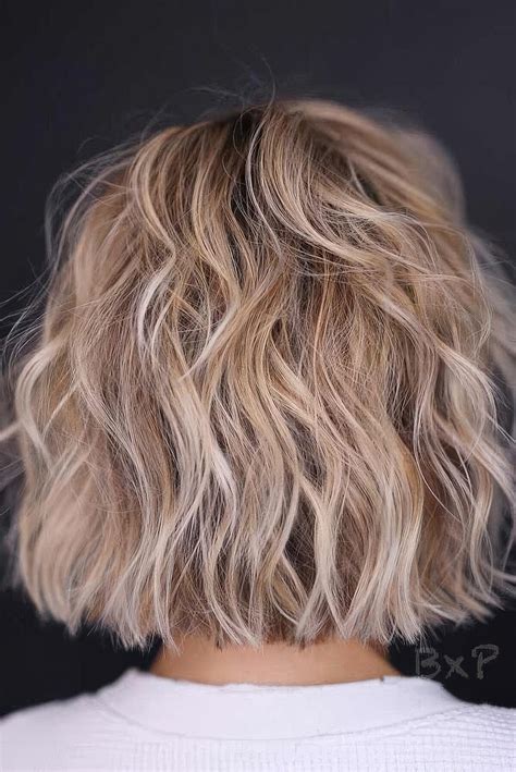 Tutorial explaining how to style a choppy bob long with flat irons 16