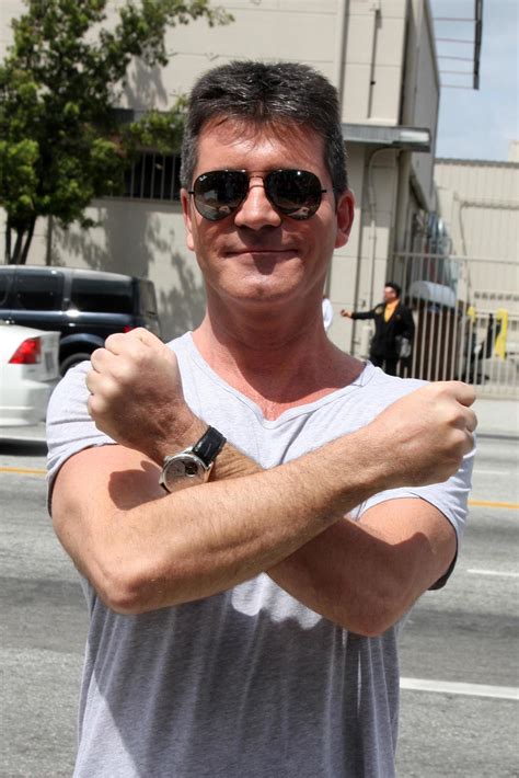 LOS ANGELES, MAY 8 - Simon Cowell , one of the talent judges, arriving