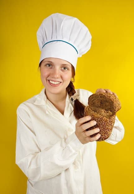 Free Photo | Baker is showing fresh bread