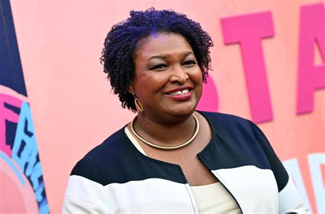 Stacey Abrams Joins Latto on Stage With ‘My Body, My Choice’ Sign in ...