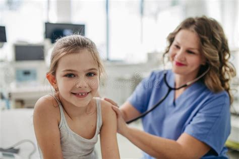 Orthopedist Examines the Spine, Posture, and Spinal Deformities of ...