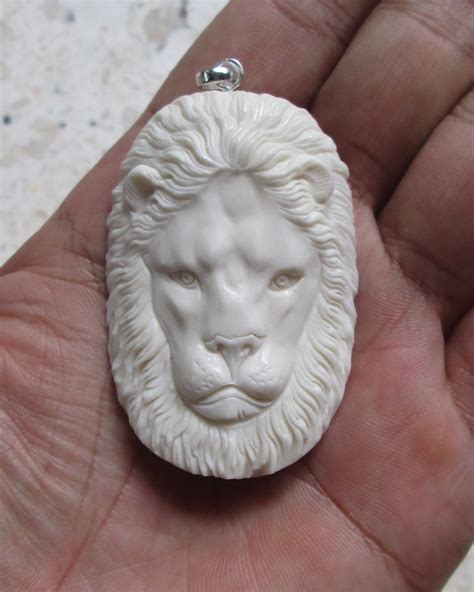lion carved bone pendants bone pendants bone carving carved bone
