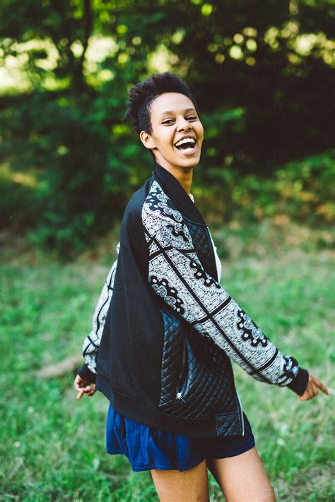 "Beautiful Black Woman Having Fun At The Park" by Stocksy Contributor