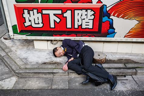 A Japanese salary man drunk and asleep on the street — Tokyo Times