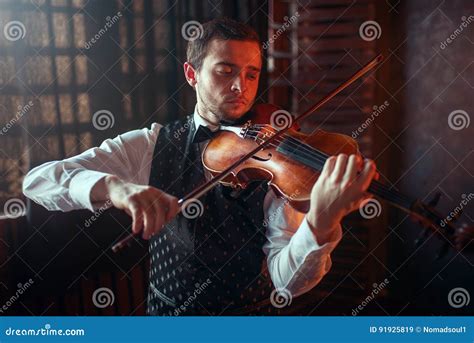 male violinist playing classical   violin stock image image