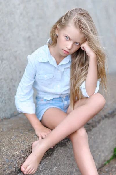 Portrait of little girl outdoors in summer Stock Photo by ©zagorodnaya ...