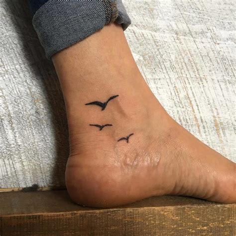 50 Small Foot Tattoos to Show Off This Summer | Small foot tattoos, Tiny bird tattoos, Foot tattoos