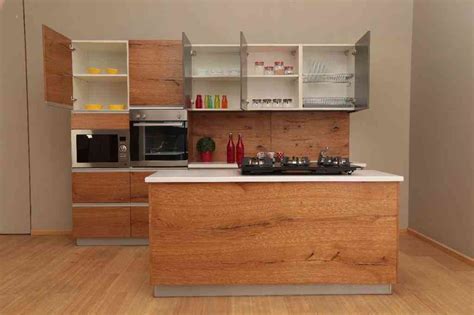 Contemporary Open Kitchen Design With Cabinets by PlanMyInterior