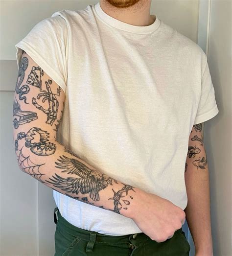Full sleeve traditional fine-line black and white tattoo sleeve men. in
