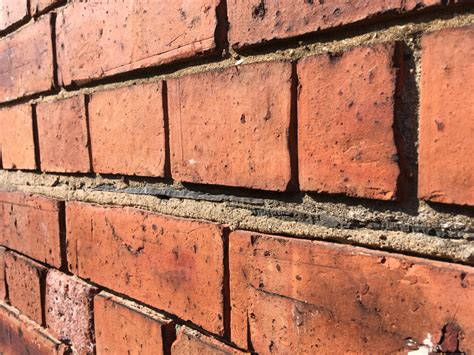 The Guide to Damp Proof Injection | Garratt's Damp & Timber