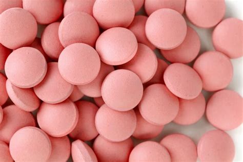 Premium Photo | Red tablets close up