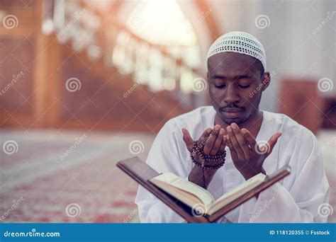 Top Viewv Of African Muslim Man Making Traditional Prayer To God While ...