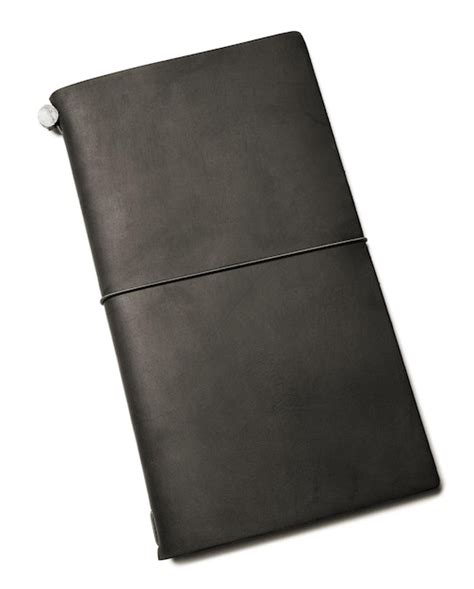 Premium Photo | Black leather notebook