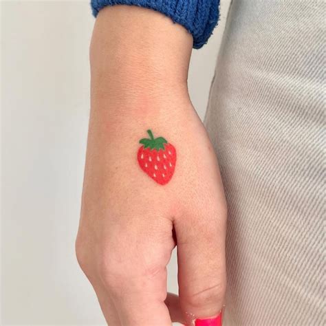 Simple Strawberry Tattoo by @meikofukimoto - Tattoogrid.net