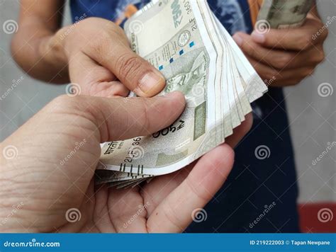 money transactions giving  receiving concept cash  hand indian