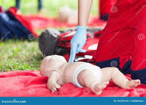 Baby CPR Dummy First Aid Training. Heart Massage Stock Image - Image of ...