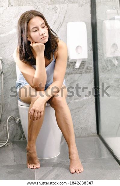 Closeup Woman Sitting On Toilet Morning Stock Photo 1842638347