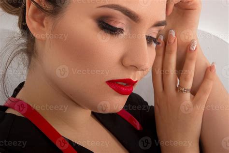 Woman in a black dreess 16098101 Stock Photo at Vecteezy