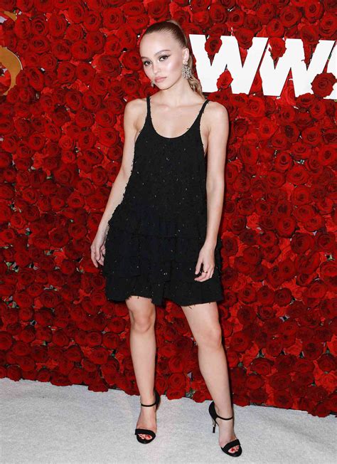lily rose depp smiles  posing topless  vogue russia shoot