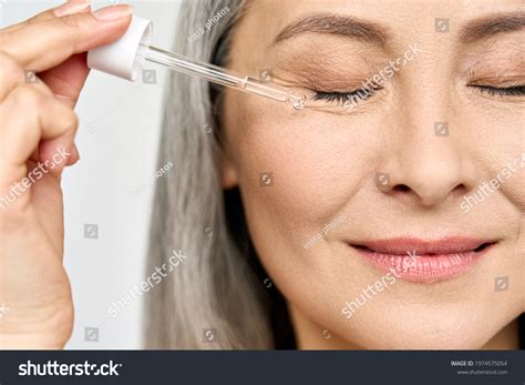 40 Woman Applying Eye Contour Serum Images, Stock Photos & Vectors ...