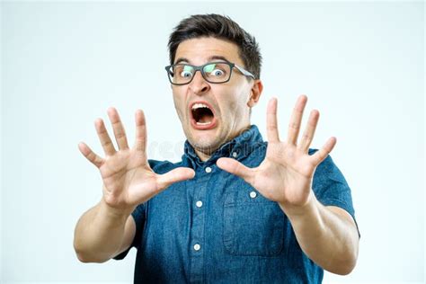 Man with Scared Expression on His Face Making Frightened Gesture Stock ...