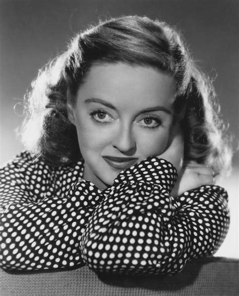 Download Legendary actress Bette Davis in a timeless polka dot dress