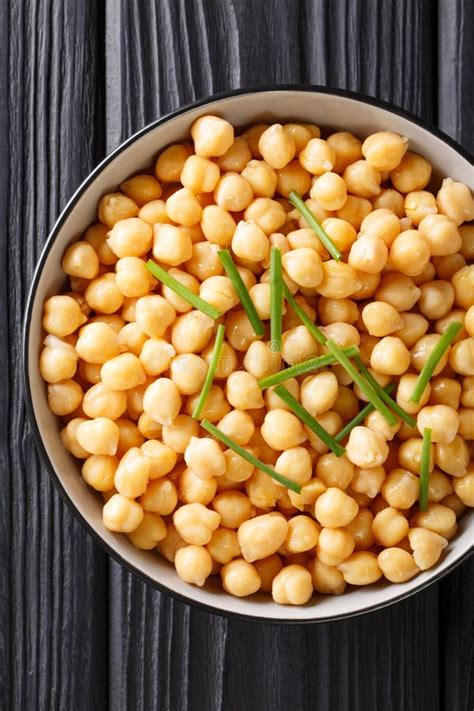 organic snack boiled chickpeas close    black bowl vertical top