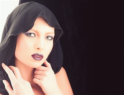 Premium Photo | Sexy pretty woman in black hood copy space