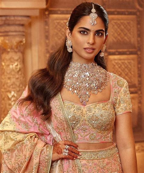 isha ambani radiates royal elegance  brother anants wedding