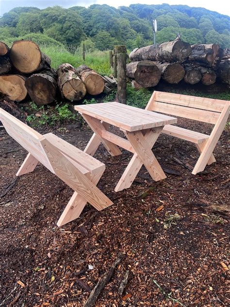 larch table  bench set  atop
