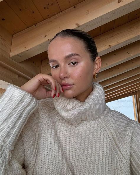 Molly-Mae Hague strips completely naked as she takes a dip in hot tub