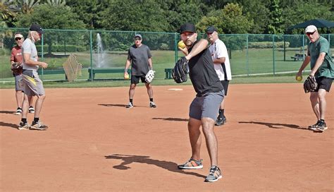 slowpitch softball throwing technique tips  beginners