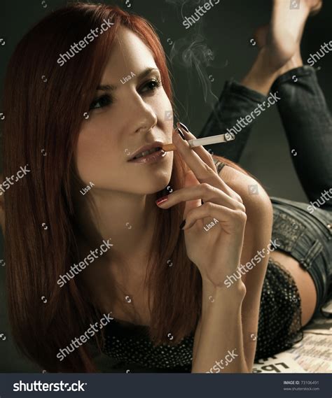 Beautiful Young Woman Smoking Cigarette Stock Photo 73106491 : Shutterstock