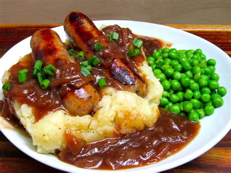 [Homemade] Bangers and Mash with Onion Gravy and Peas - Dining and Cooking