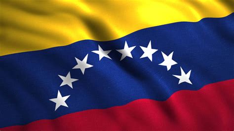 The flag of Venezuela.Motion .Tricolor flag with white stars in the