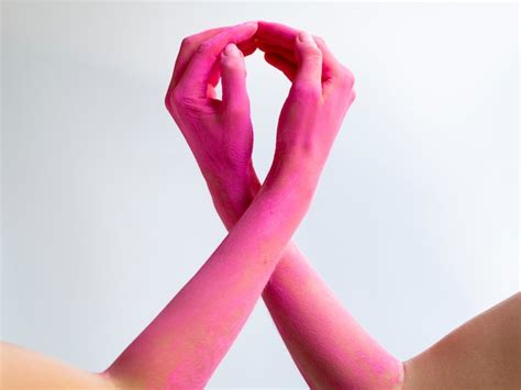 Premium Photo | Close-up pink arms expressing awareness