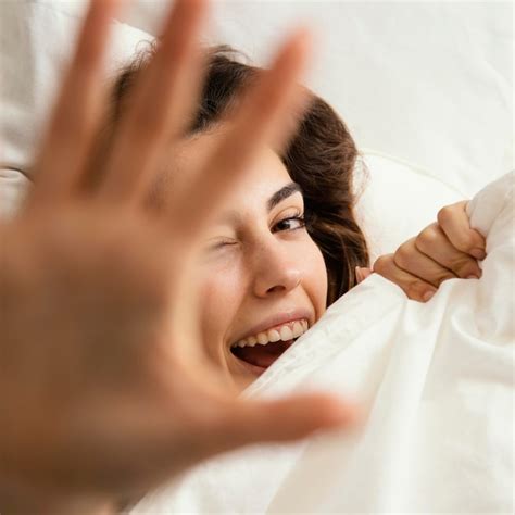 Free Photo | Flat lay of woman hiding under the sheets at home