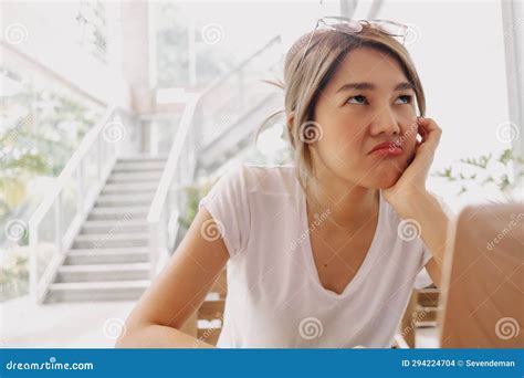 unpleasant face  woman work  solving problem
