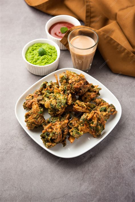 Premium Photo | Homemade tasty Palak pakoda or pakora known as Spinach