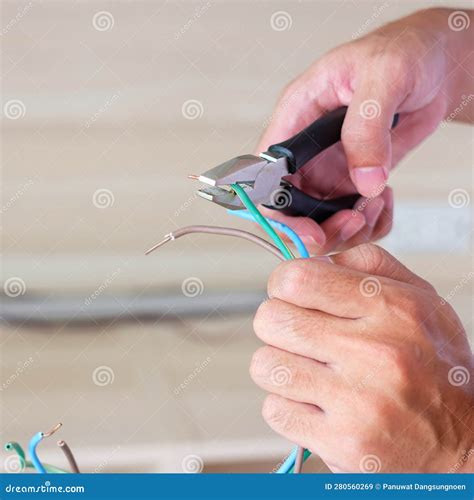 Electrician Cuts Electrical Wires with Pliers, Wiring Cables