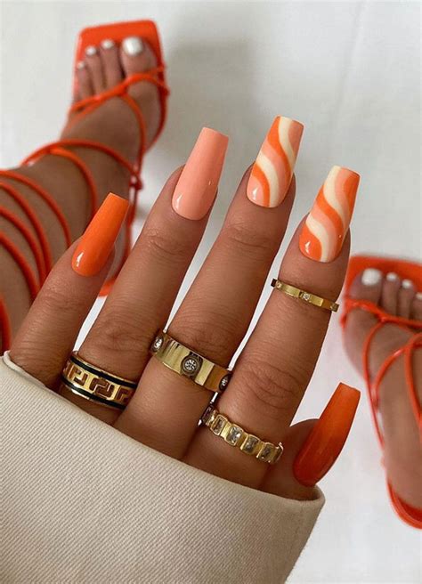 35 Cute Orange Nail Ideas To Rock in Summer : Orange Swirl Coffin Nails