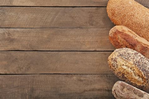 premium photo bread  wooden background